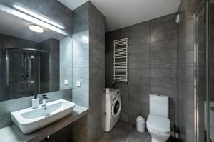 Kúpeľňa v ubytovaní Waw Apartamenty Manhattan