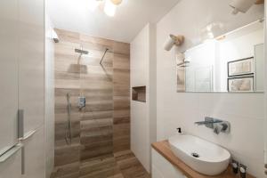 Kúpeľňa v ubytovaní Waw Apartamenty Manhattan