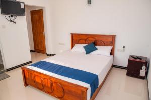 Postel nebo postele na pokoji v ubytování Sky Edge Homestay + 10 fotografií