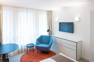 Uma TV ou centro de entretenimento em Studiohouse Frankfurt