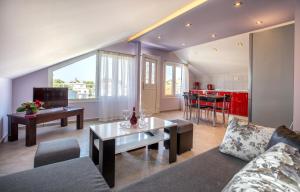 a living room with a couch and a table at Dorothea Suite in Potos
