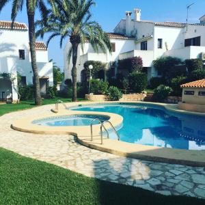 The swimming pool at or close to El Raconet de Dénia