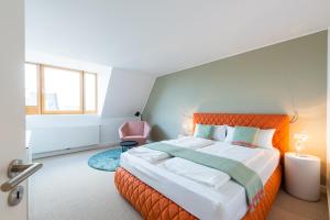 Cama ou camas em um quarto em Studiohouse Frankfurt