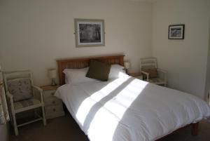 Cama ou camas em um quarto em Hare & Hounds Bed & Breakfast