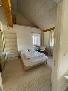Llit o llits en una habitació de Chalet / Maison Bourgeoise entièrement rénovée