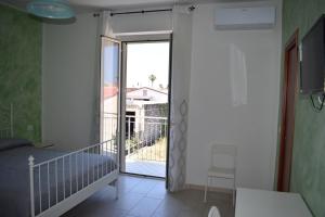 Postel nebo postele na pokoji v ubytování B&B Da Zio Peppe