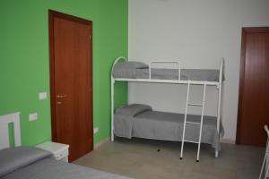 Postel nebo postele na pokoji v ubytování B&B Da Zio Peppe