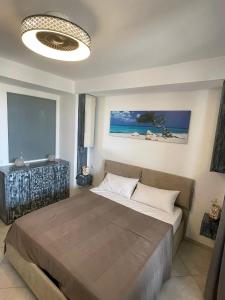Luxury Beachhouse Apartment Boa Vista tesisinde bir odada yatak veya yataklar