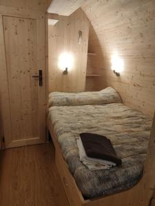 Łóżko lub łóżka w pokoju w obiekcie TEIRABOA BASE CAMP