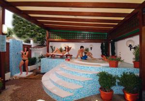 Bazén v ubytování Hotel Cristina nebo v jeho okolí