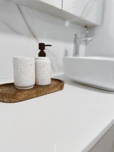 a bathroom with two rolls of toilet paper on a counter at Apartment in central Dubrovnik with private parking in Dubrovnik