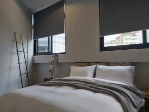 Postel nebo postele na pokoji v ubytování Huck B&B