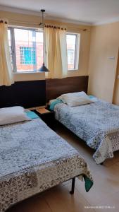 Postel nebo postele na pokoji v ubytování Hotel VIYAJE