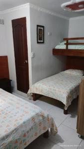Postel nebo postele na pokoji v ubytování Hotel VIYAJE
