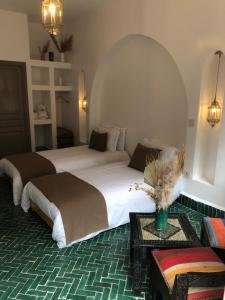 Ένα ή περισσότερα κρεβάτια σε δωμάτιο στο Ksar Shama