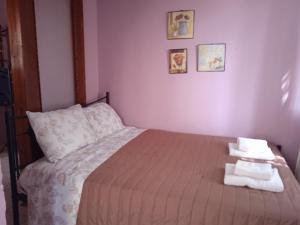 Postel nebo postele na pokoji v ubytování Sitzanaki Home