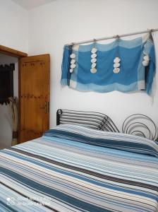 Postel nebo postele na pokoji v ubytování Al Vecchio Trullo