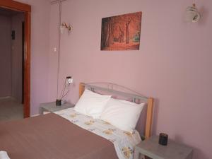 Postel nebo postele na pokoji v ubytování Sitzanaki Home