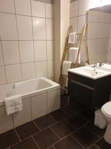Ванная комната в Hôtel Saint Cyr