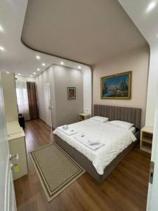 Postel nebo postele na pokoji v ubytování Hotel Holiday