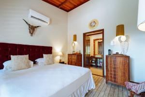 Postel nebo postele na pokoji v ubytování Hotel Pousada Boutique Coco Bambu Morere