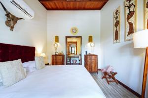 Postel nebo postele na pokoji v ubytování Hotel Pousada Boutique Coco Bambu Morere