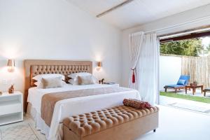 Postel nebo postele na pokoji v ubytování Hotel Pousada Boutique Coco Bambu Morere + 37 fotografií