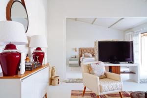 TV a/nebo společenská místnost v ubytování Hotel Pousada Boutique Coco Bambu Morere