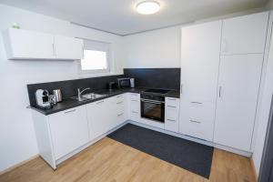 A cozinha ou cozinha compacta de WOHNUNG OBERGESCHOSS mit 3 Schlafzimmer in ruhiger Gegend