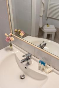 Koupelna v ubytování Hotel La Pace