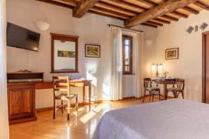 Postel nebo postele na pokoji v ubytování Hotel La Pace