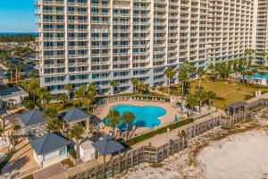 an aerial view of the resort with a pool and a large building at The Beach Club Resort and Spa in Gulf Shores