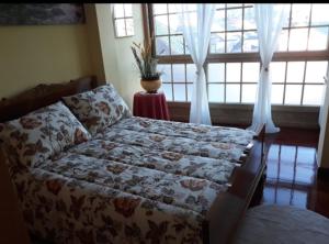 A bed or beds in a room at A casa do clarete
