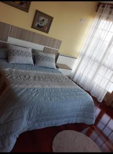 A bed or beds in a room at A casa do clarete