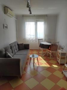 Svetainės erdvė apgyvendinimo įstaigoje Sunny apartment in Rijeka