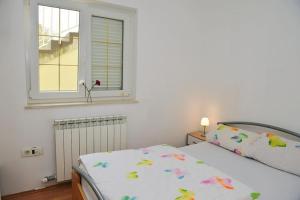 Posteľ alebo postele v izbe v ubytovaní Apartments Relax near Opatija