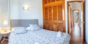 Postel nebo postele na pokoji v ubytování Villa Blanc