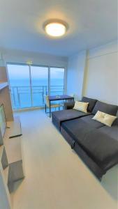 Postel nebo postele na pokoji v ubytování Fantastico apartamento Faro de cullera a primera linea mar abierto playa de los olivos