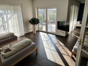 Postel nebo postele na pokoji v ubytování Penthouse