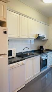 Cuisine ou kitchenette dans l'établissement Anadia Chic Apartment