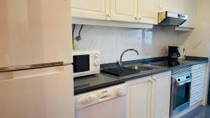 Cuisine ou kitchenette dans l'établissement Anadia Chic Apartment