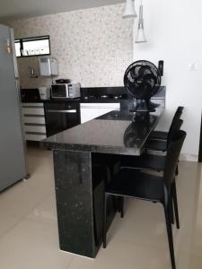 Nhà bếp/bếp nhỏ tại Férias na Praia