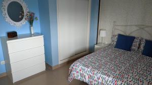 Posteľ alebo postele v izbe v ubytovaní Apartamento Candelaria vivienda vacacional