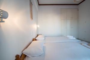 Postel nebo postele na pokoji v ubytování Melissa Rooms Naxos