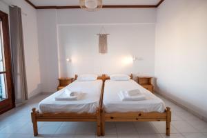 Postel nebo postele na pokoji v ubytování Melissa Rooms Naxos