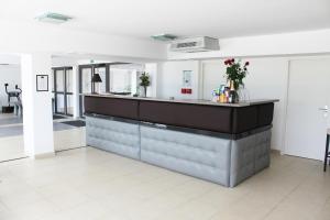 The lobby or reception area at Adonis Aix en Provence