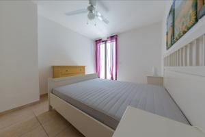 Giường trong phòng chung tại Villa Maldive del Salento