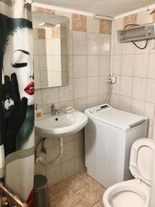 Ett badrum på T’ Giorgio Apartment