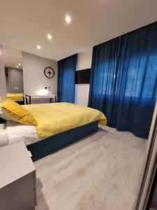 Posteľ alebo postele v izbe v ubytovaní Luksusowy apartament na Starym Miescie
