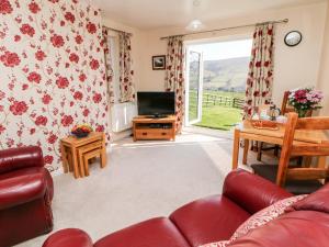 TV/trung tâm giải trí tại Hathaway Cottage